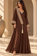 Chocolate Brown full-length cotton dress with cream hand embroidery, a V-neck, diagonal embroidered panel, long sleeves and tassel.