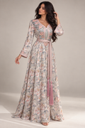 NC#EMB1 — Pale floral full-length dress with decorative bodice and pink waist tie.