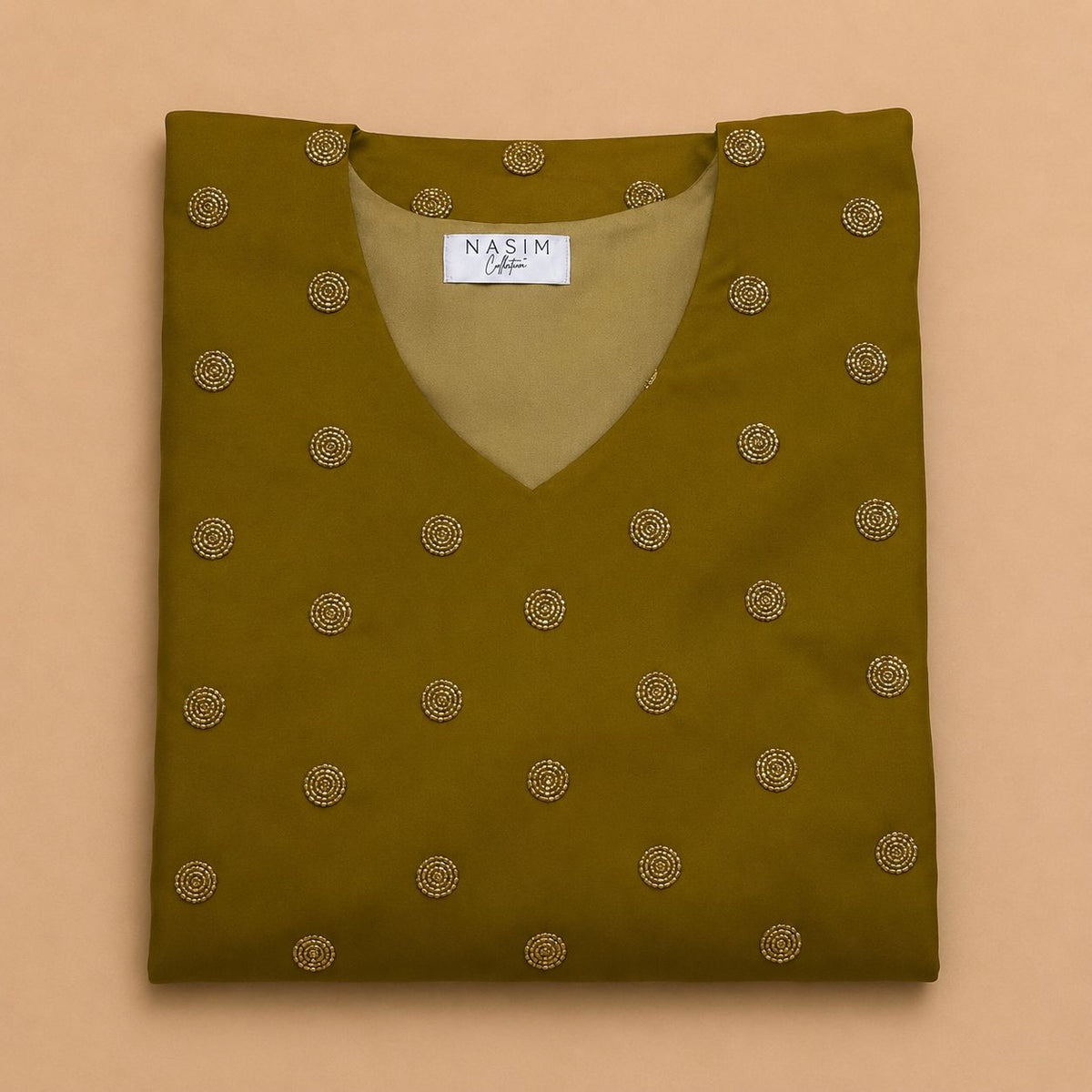 NC#MK13 — Folded olive Mkhawar with circular motifs.