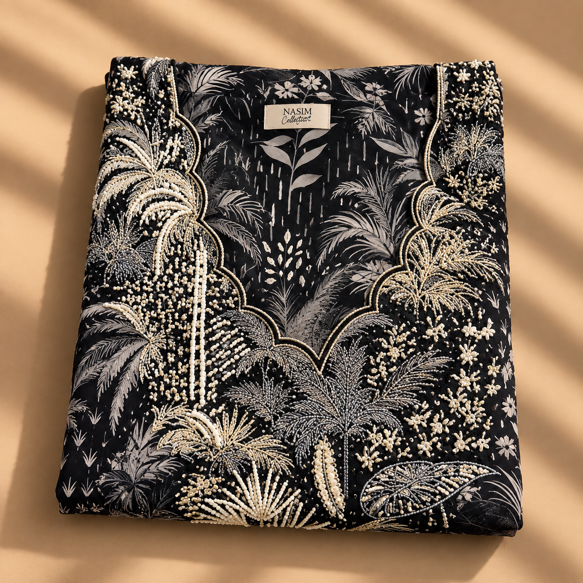 NC#MK16 — Folded black and white botanical-print Mkhawar.