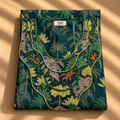 NC#MK17 — Folded green floral-print cotton mkhawar with decorative neckline.