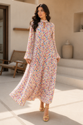 Soft Bloom — Light floral long-sleeve dress, walking front view.