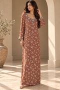 Terracotta floral cotton Mkhawar jalabeya with cream flowers, teal accents, a rounded neckline and long sleeves.