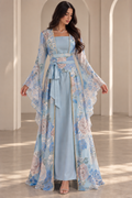 The Everlasting Edit — Blue dress with floral outer layer and waist bow.