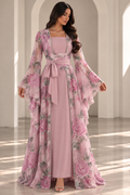 The Everlasting Edit — Pink dress with floral outer layer and waist bow.