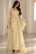 The Everlasting Edit — Yellow dress with floral outer layer and waist bow.