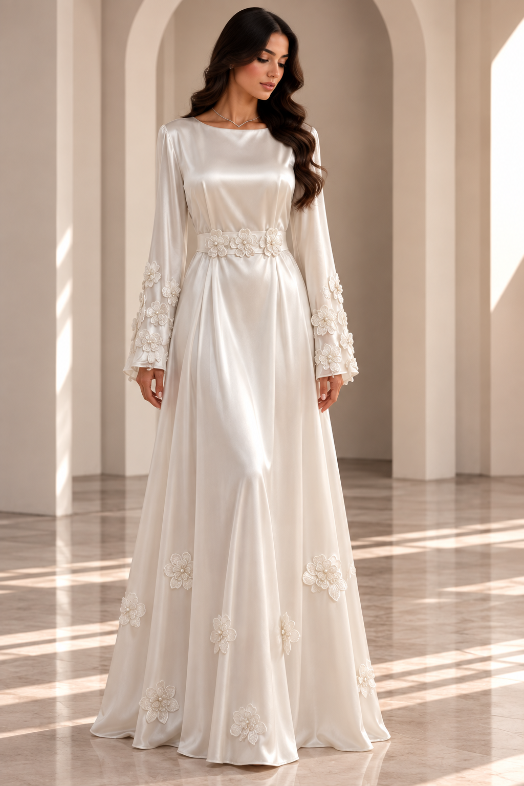 The Pearl Garden Edit — Ivory long-sleeve gown with waist detail and floral cuffs.