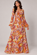 Valencia — Orange and purple paisley long-sleeve dress with flared cuffs.